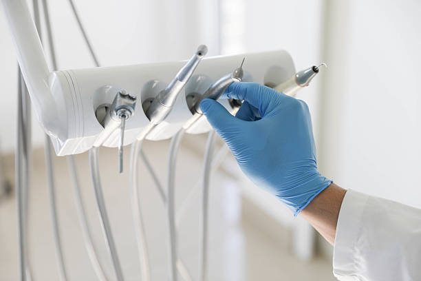 Professional Emergency Dentist technician working in Grandview, TX
